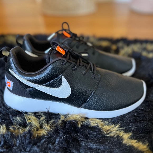 Nike Shoes - NEVER WORN Faux Leather Nike Roshe Run Sneakers!